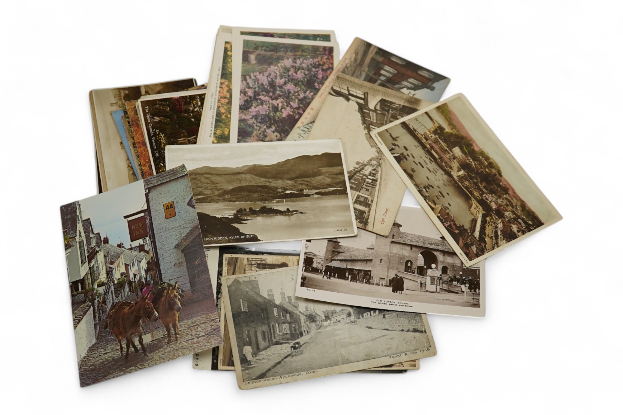 A quantity of loose early 20th century topographical postcards and ephemera. Condition - variable